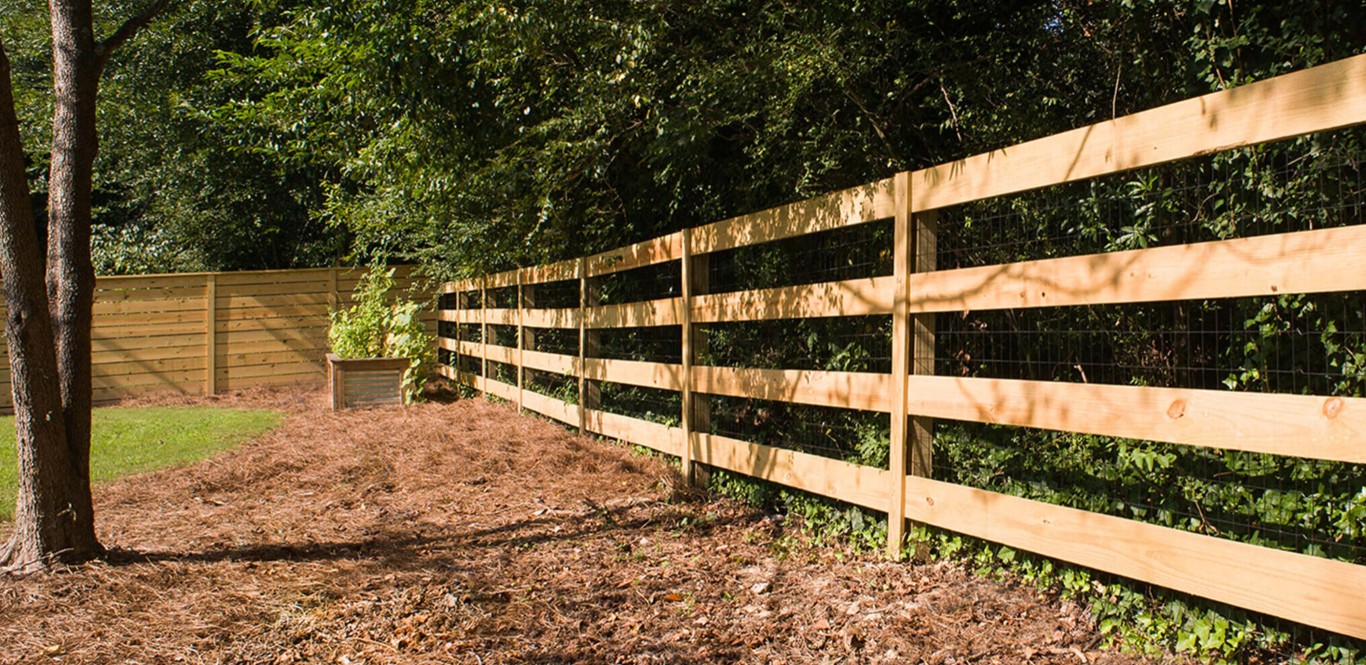Three-rail wood fence repair and replacement service in Santa Cruz
